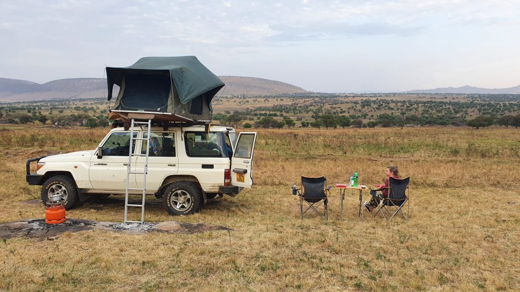 car with rooftop tent