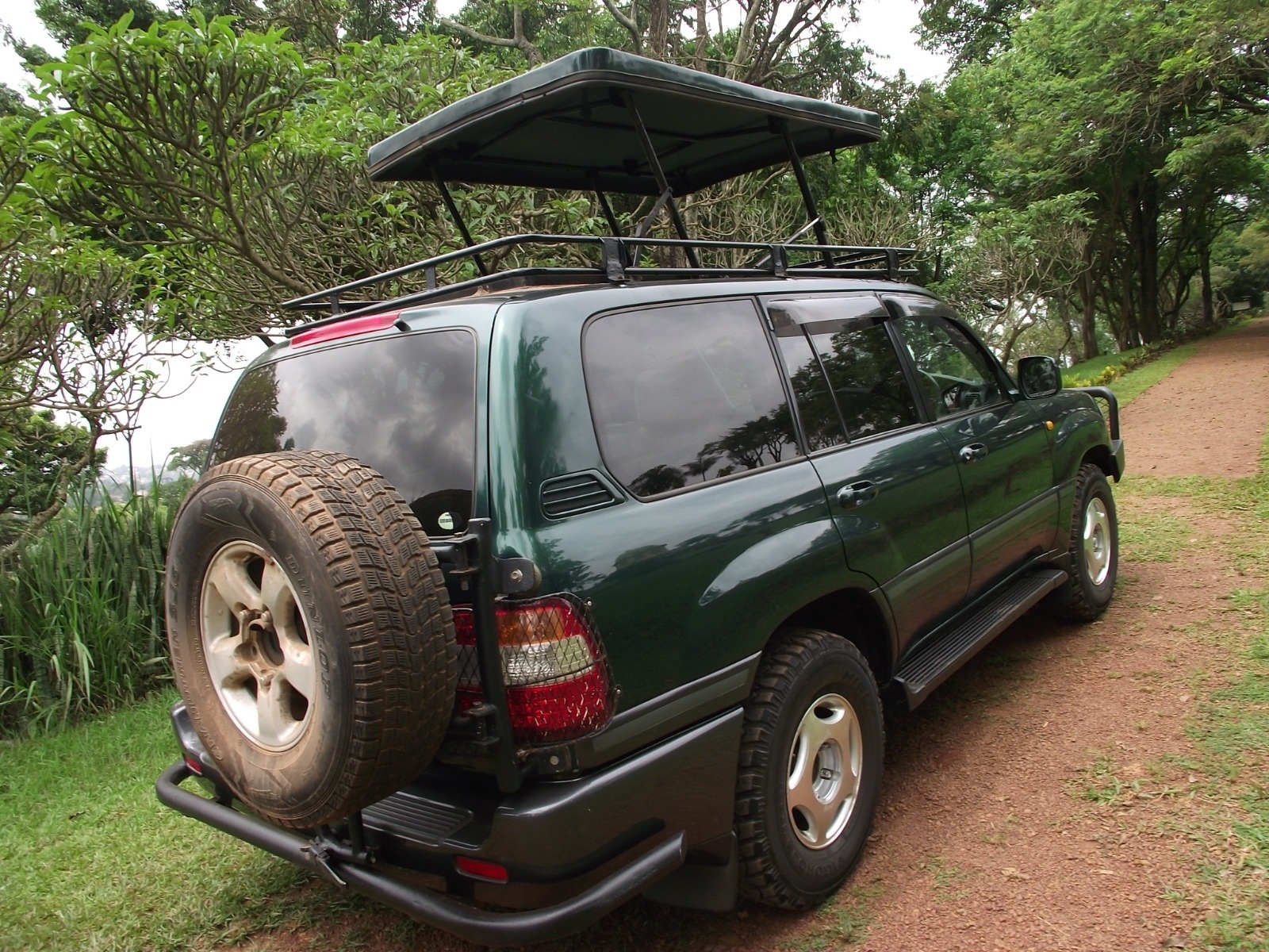 4x4rentals uganda fleet landcruiser TX green popup roof