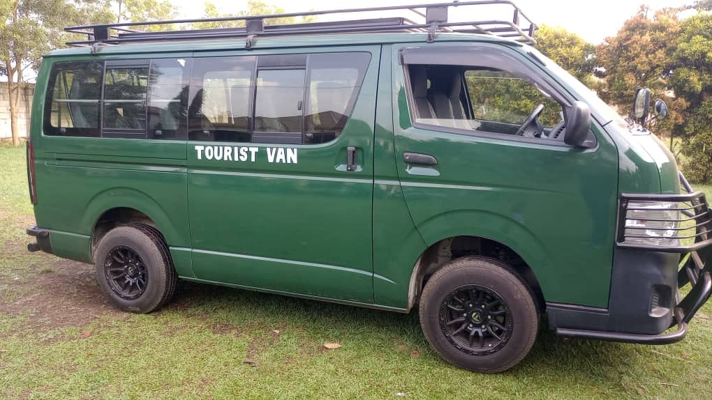 4x4rentals uganda fleet toyota minivan drone green popup roof