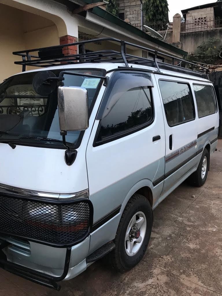 4x4rentals uganda fleet toyota minivan white popup roof